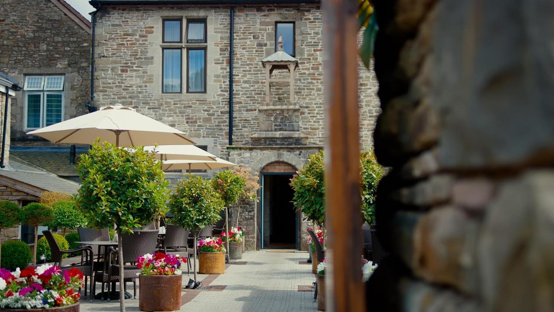 Lanelay Hall Hotel & Spa Hensol Exterior foto The courtyard at The Old Bank Hotel